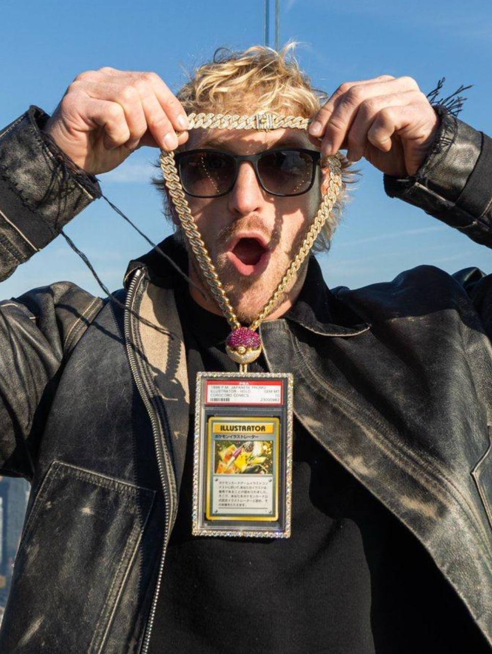 Logan Paul wearing the Pikachu Illustrator PSA 10 as a necklace