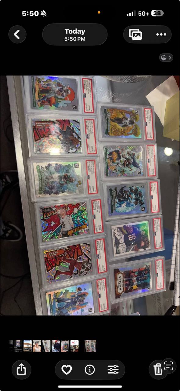 Counterfeit PSA slabs showing modern football cards