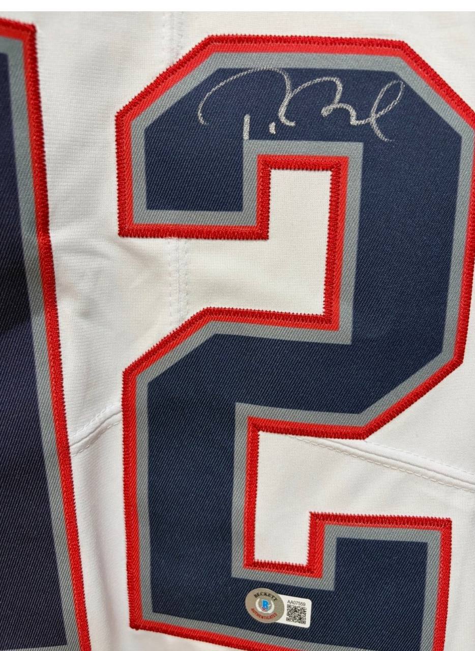 Fake Tom Brady autograph with real Beckett certification number